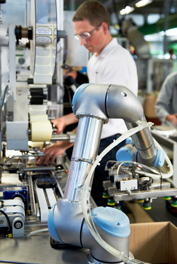 Cobot working with human in factory